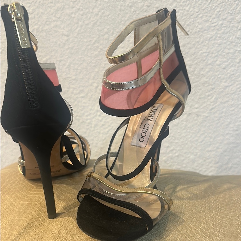 Jimmy Choo Black and Gold Heels with Strappy Design and High Stiletto